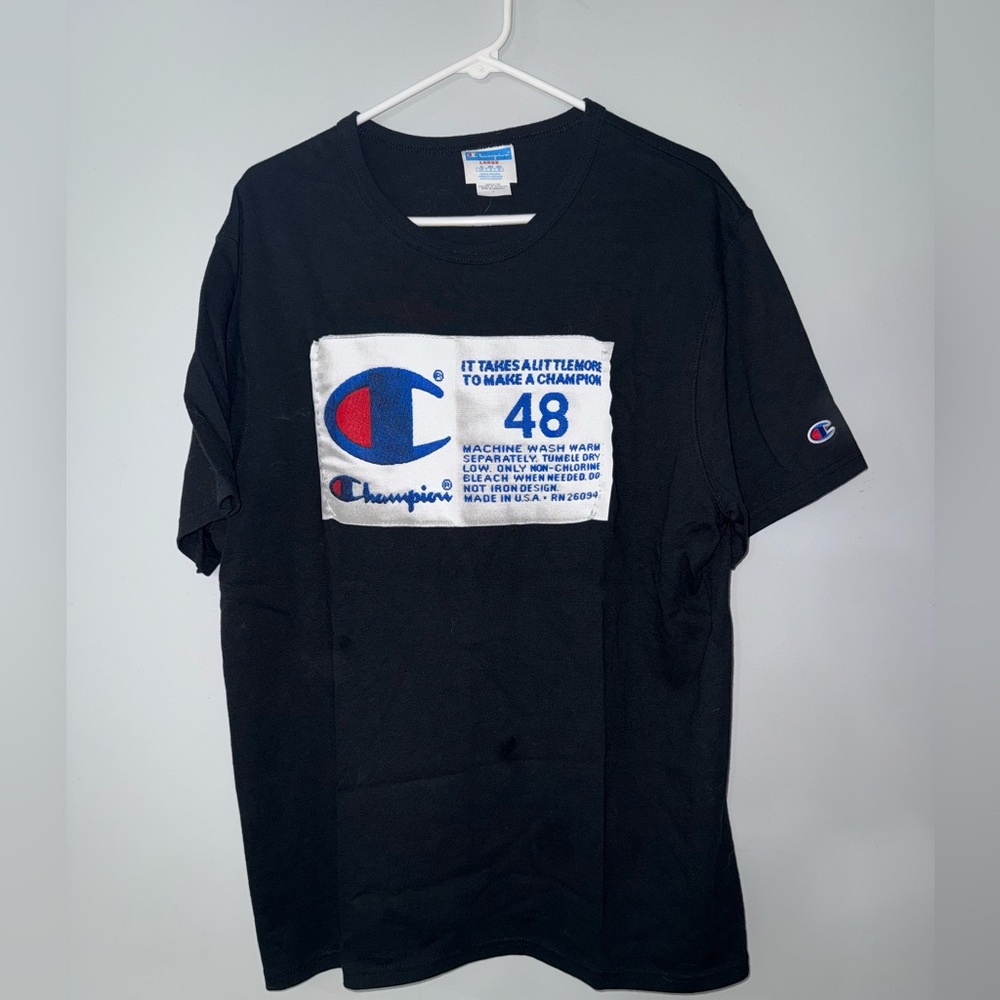 Champion’s men’s size large shirt